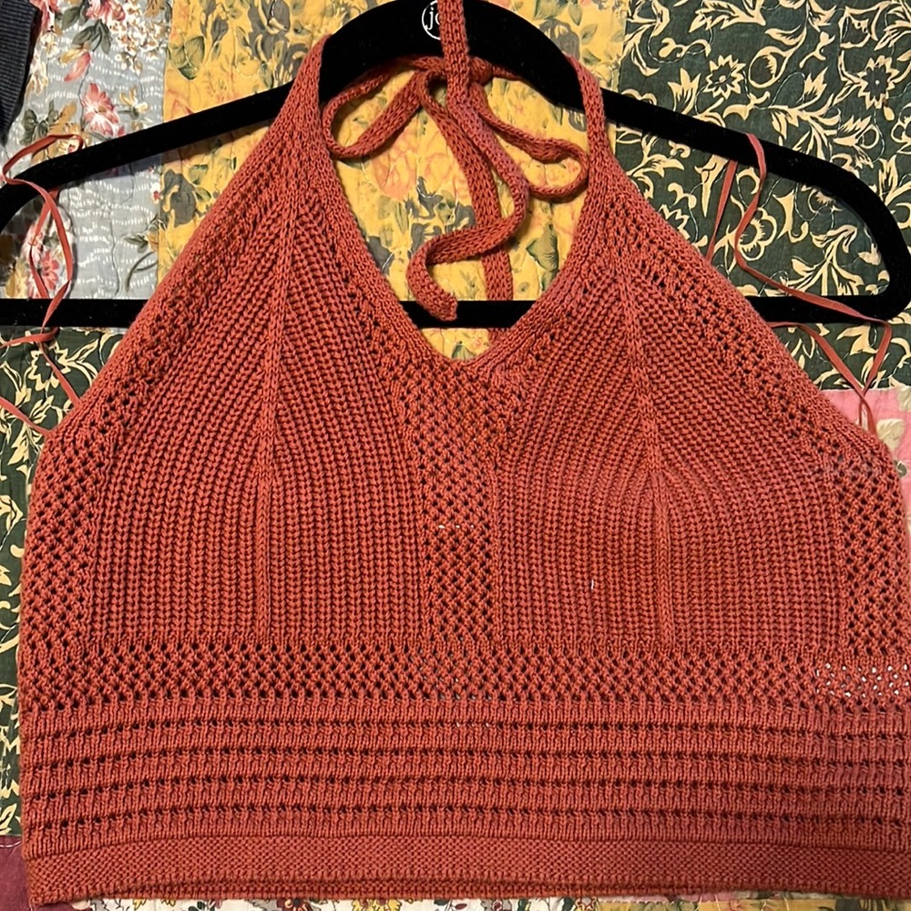 Crotchet burnt orange halter top.